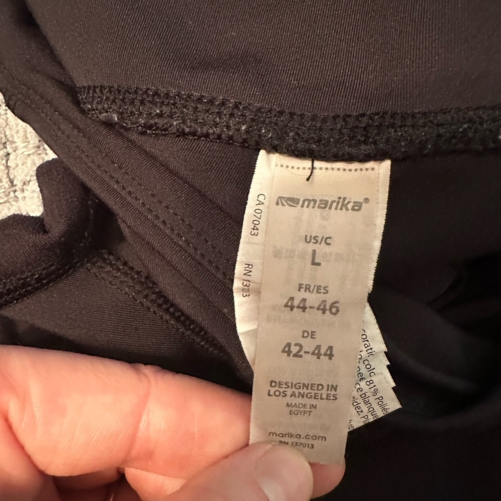 Size large black Marika workout pants. Capris